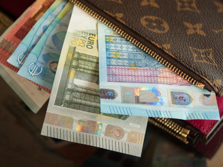 Wallet with Euro notes coming out
